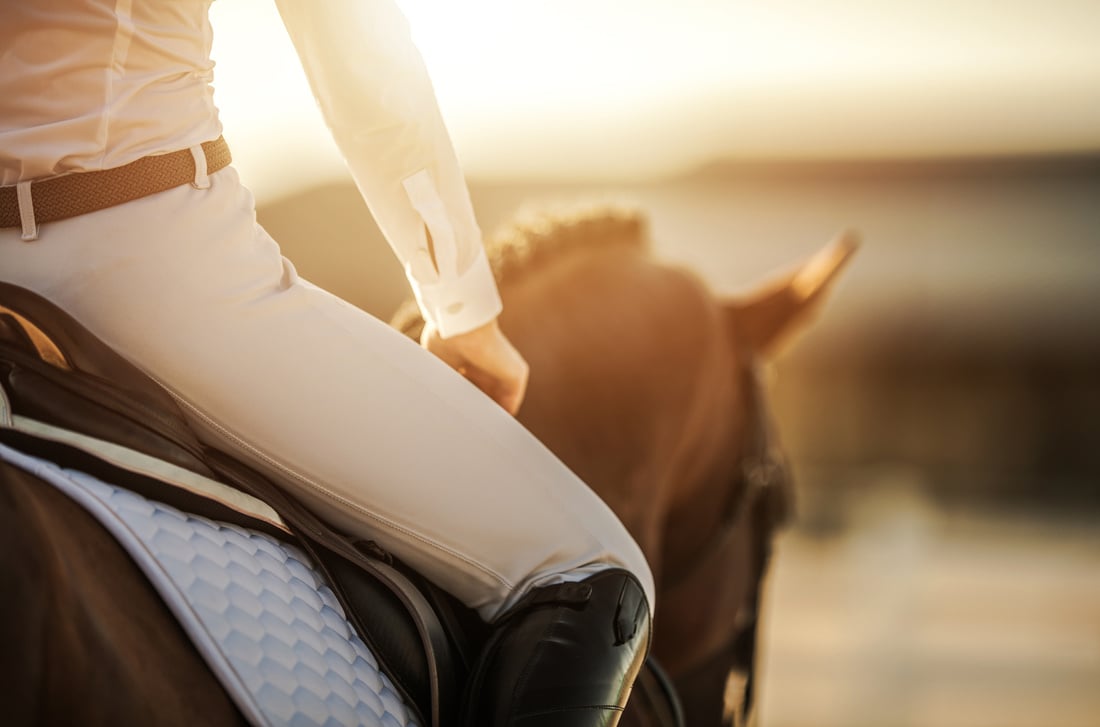 Closeup of a Person Riding a Horse